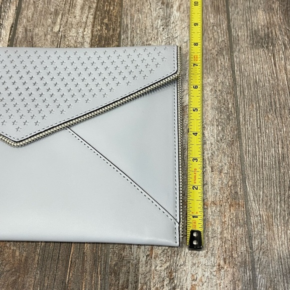 Rebecca Minkoff Star Perforated Leo Clutch - Picture 5 of 9